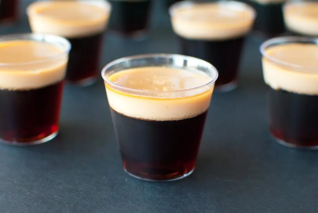 A close up picture of a Baby Guinness Jello Shots