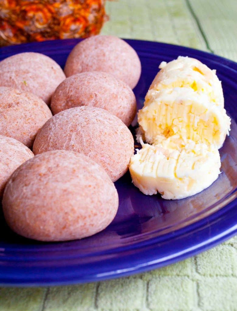 Side view of four taro rolls with compound lychee butter