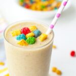 Close up of cereal milk smoothie with Captian Crunch berries on top
