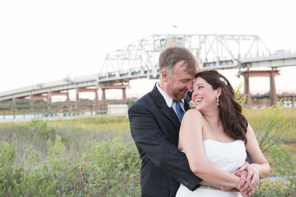 wedding couple in front of ben sawyer bridge