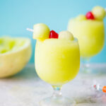 Spiked Melon Ball Slushies: A frozen twist on the classic melon ball drink made with freshly frozen Honeydew, melon liquor, melon vodka, and sweet pineapple juice.