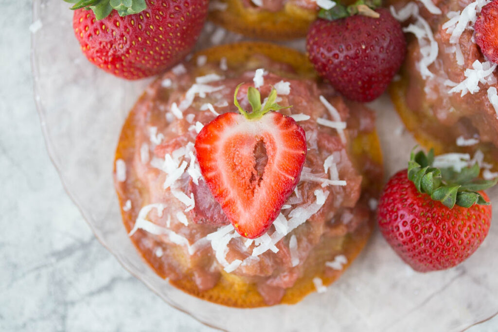 Mini Gluten Free Strawberry Rhubarb Upside Down Cake Recipe: Bursting with sweet strawberries, sour rhubarb, and a spritz of summery lemon, these gluten-free & refined sugar-free w/ vegan option Strawberry Rhubarb Upside Down Cakes taste like a breezy summer day in the Southern sun! 