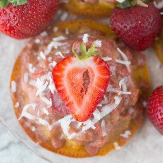 Mini Gluten Free Strawberry Rhubarb Upside Down Cake Recipe: ursting with sweet strawberries, sour rhubarb, and a spritz of summery lemon, these gluten-free & refined sugar-free w/ vegan option Strawberry Rhubarb Upside Down Cakes taste like a breezy summer day in the Southern sun!