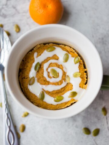 Gluten Free Pumpkin Cinnamon Roll in a Mug: This amazing quick, easy, and healthy paleo mug cake recipe is the perfect healthy fall breakfast!