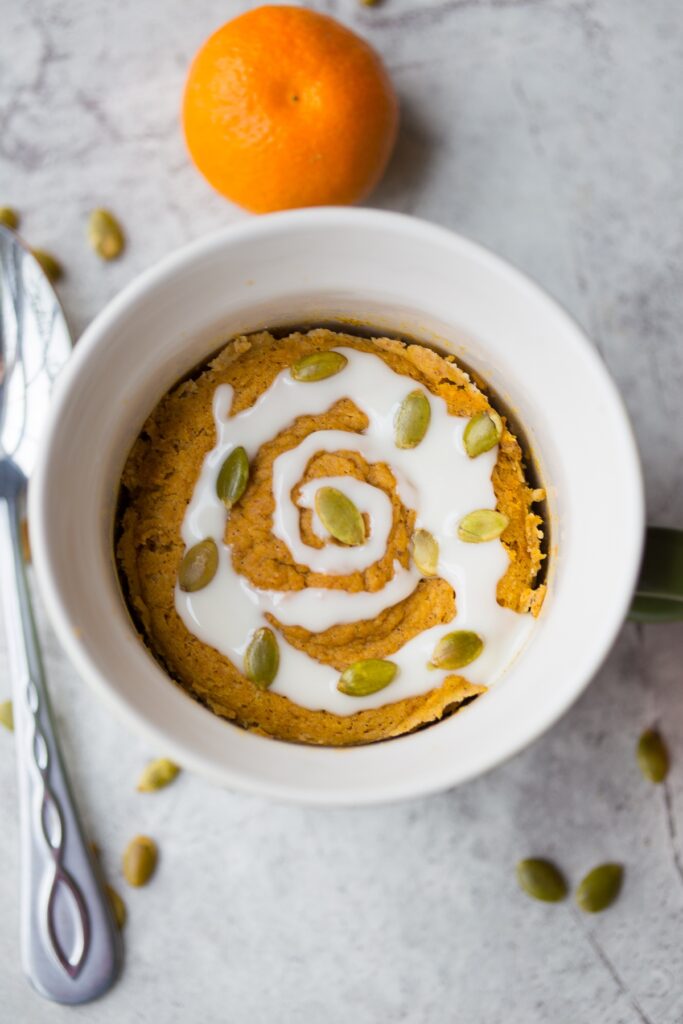 Gluten Free Pumpkin Cinnamon Roll in a Mug: This amazing quick, easy, and healthy paleo mug cake recipe is the perfect healthy fall breakfast!