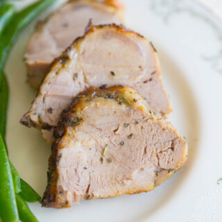 Oven Roasted Garlic Herb Pork Loin: This quick and easy dinner recipe is a lifesaver when you've had a hectic day and need to get dinner on the table STAT!