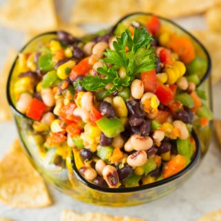 Crunchy, salty, savory and sweet, this Texas Caviar Blackeyed Pea Dip is an awesome healthy snack food that's perfect for tailgating, football or superbowl parties, camping, or picnics!