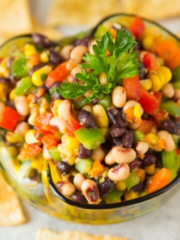 Crunchy, salty, savory and sweet, this Texas Caviar Blackeyed Pea Dip is an awesome healthy snack food that's perfect for tailgating, football or superbowl parties, camping, or picnics!