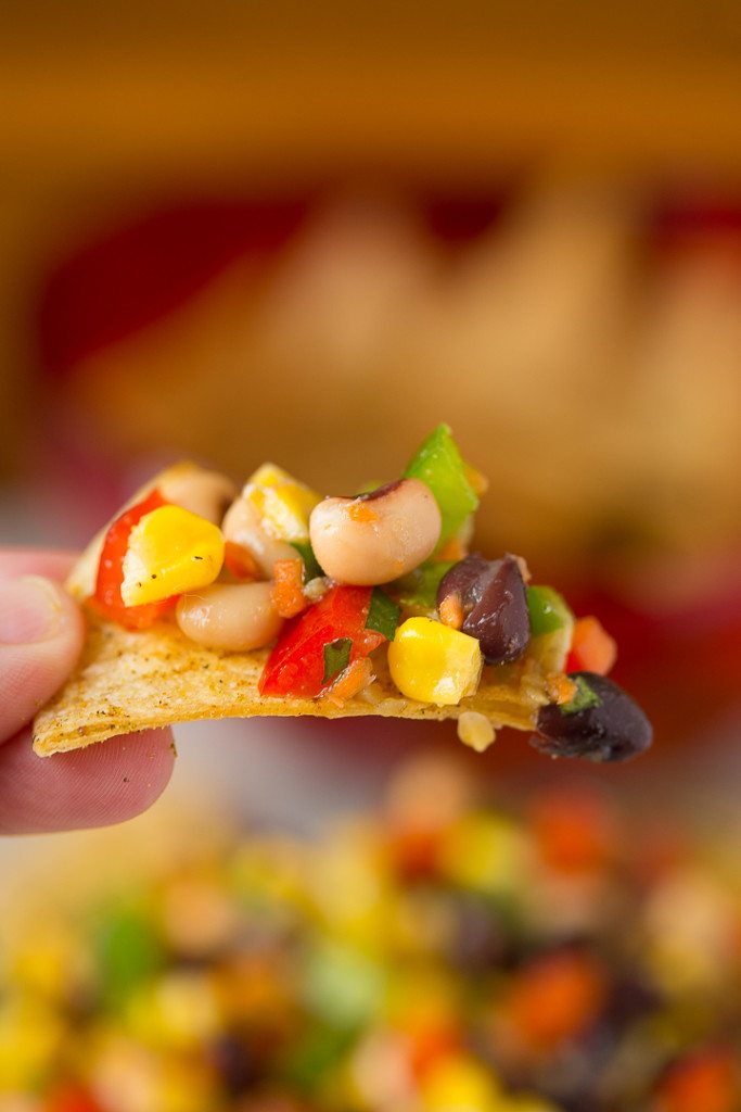 Crunchy, salty, savory and sweet, this Cowboy Caviar Blackeyed Pea Dip is an awesome healthy snack food that's perfect for tailgating, football or superbowl parties, camping, or picnics! 