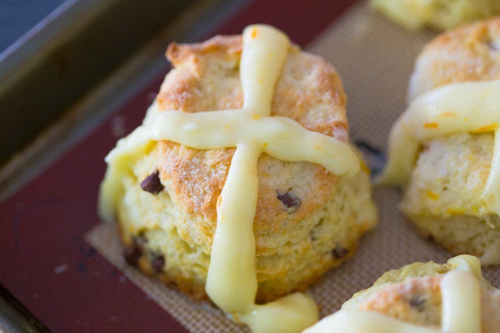 Chocolate Orange Hot Cross Biscuits are a southern take on the classic hot cross buns served on Good Friday. Made without yeast and easily pulled together in ten minutes or less, these chocolate orange biscuits will easily become a staple on Easter Sunday! 