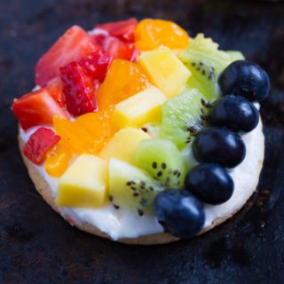 Personal Rainbow Fruit Pizzas with Key Lime Cream Cheese Frosting