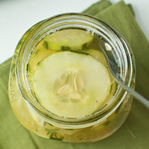 Cucumbers and Vinegar in mason jar