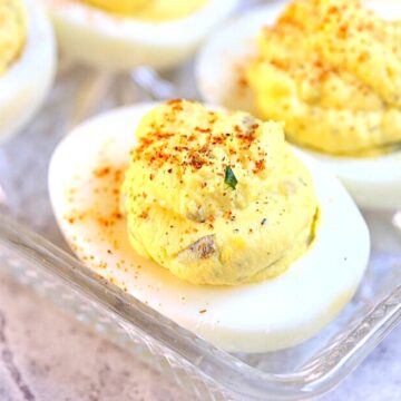 Close up of easy deviled eggs garnished with paprika