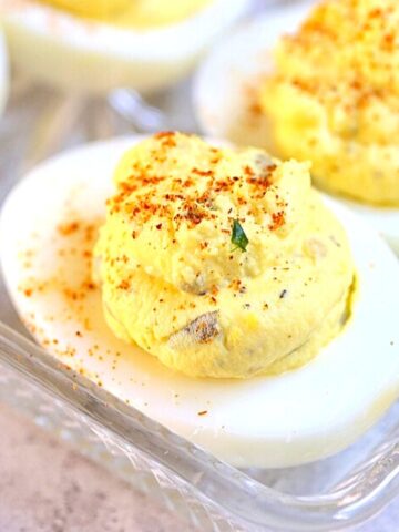 Close up of easy deviled eggs garnished with paprika